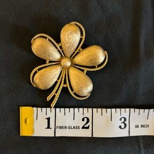 Trifari vintage gold flower brooch.